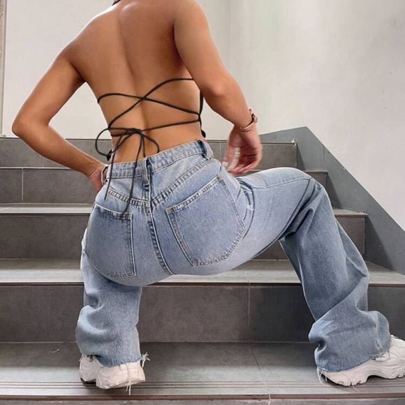 Elevate your style with this chic black halter neck top. Perfect for any occasio - Picture 2 of 2